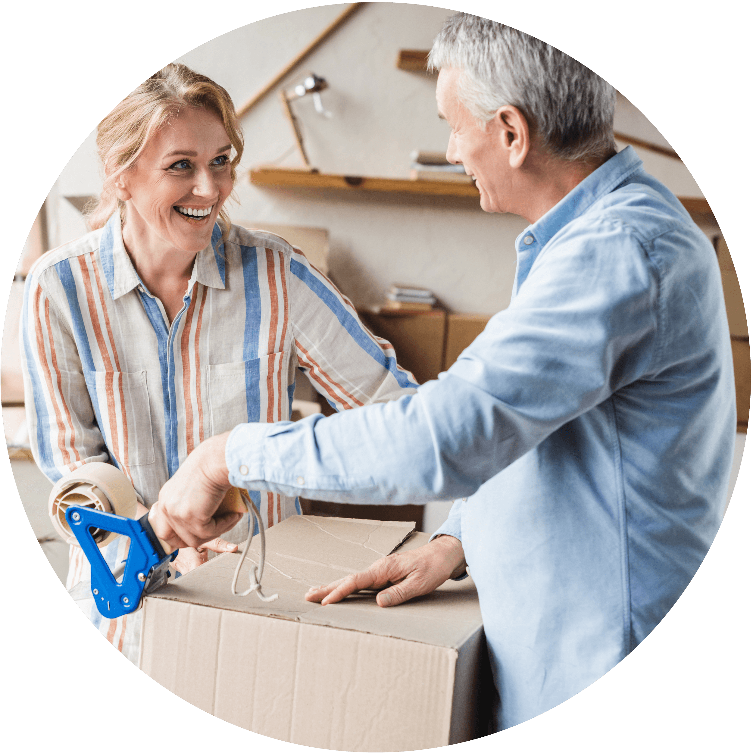 An estate agent is smiling at a client while going through paperwork